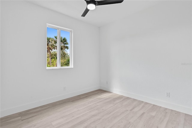 unfurnished room featuring ceiling fan and light wood-type flooring