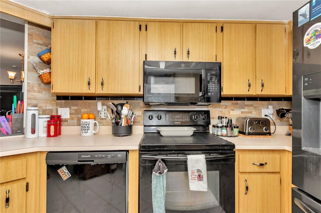 kitchen with decorative backsplash and black appliances