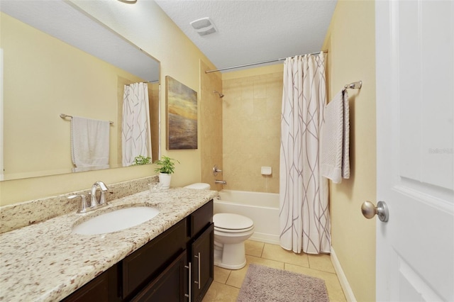 full bathroom with toilet, a textured ceiling, vanity, shower / bath combo, and tile patterned flooring