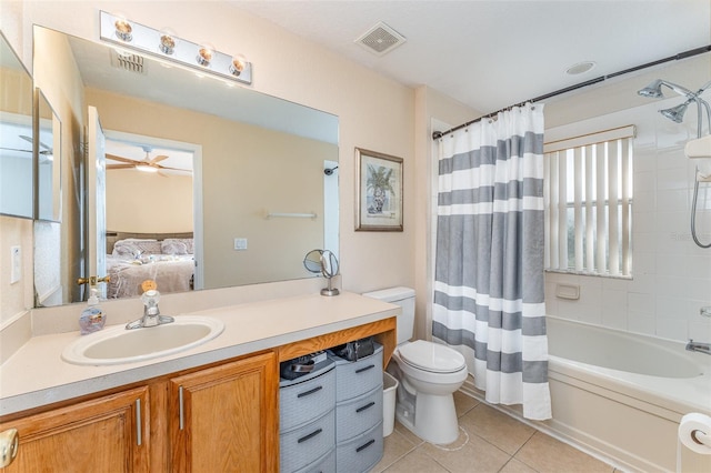 full bathroom featuring toilet, shower / tub combo, vanity, ceiling fan, and tile patterned flooring