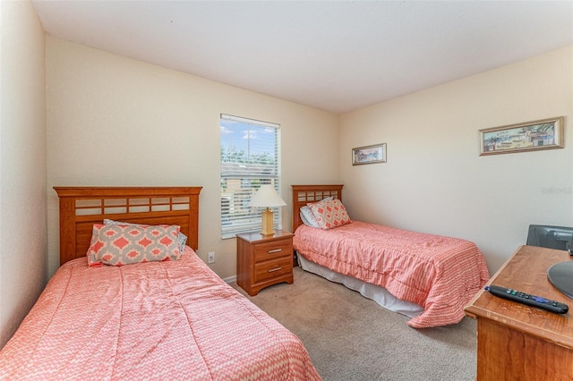 bedroom featuring carpet flooring