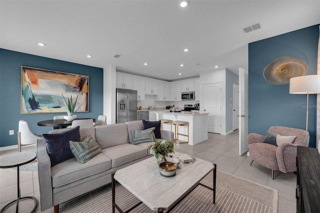 living room featuring light tile patterned floors