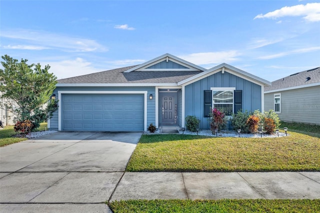 ranch-style house with a garage and a front yard