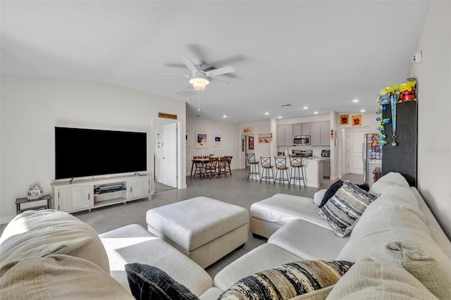 living room featuring ceiling fan