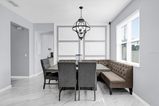 3337 Reedy Glen Dr, Kissimmee, FL 34758 - dining room featuring a notable chandelier