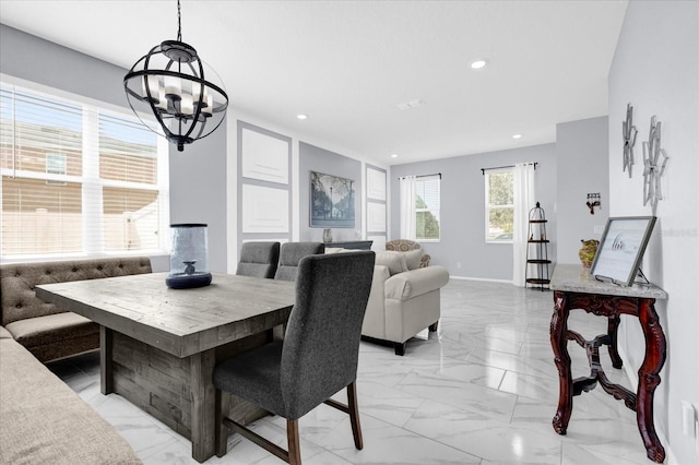3337 Reedy Glen Dr, Kissimmee, FL 34758 - dining room with an inviting chandelier