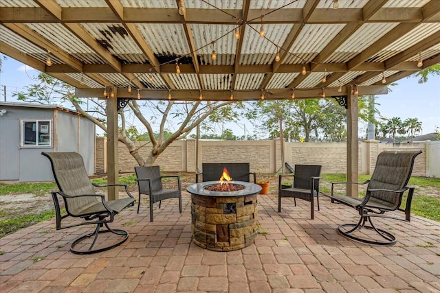 3337 Reedy Glen Dr, Kissimmee, FL 34758 - view of patio / terrace with a storage shed and a fire pit