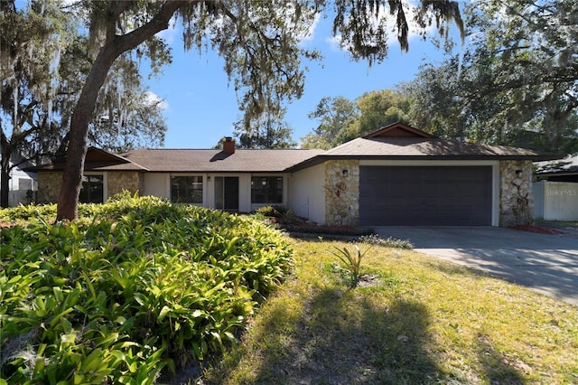 single story home with a garage