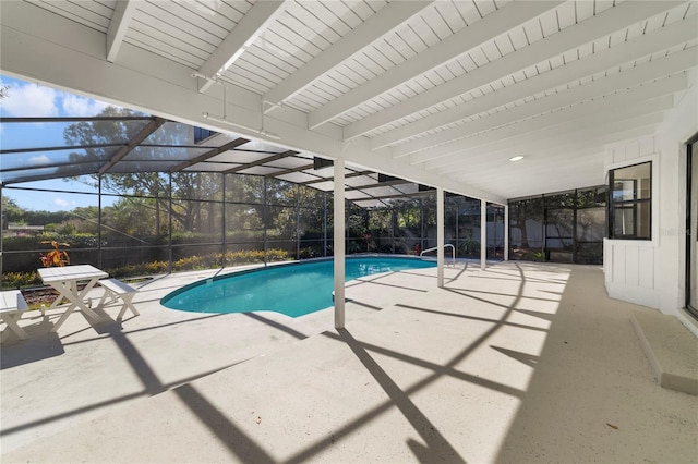 view of pool featuring a lanai and a patio area