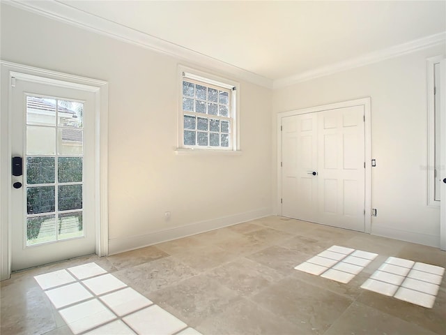 spare room with crown molding