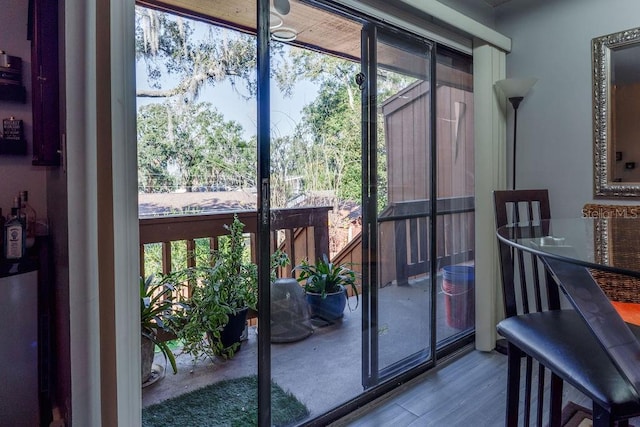 doorway to outside featuring hardwood / wood-style flooring