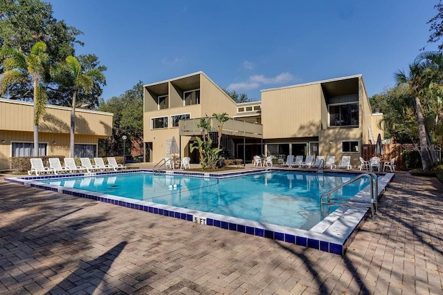 view of swimming pool featuring a patio