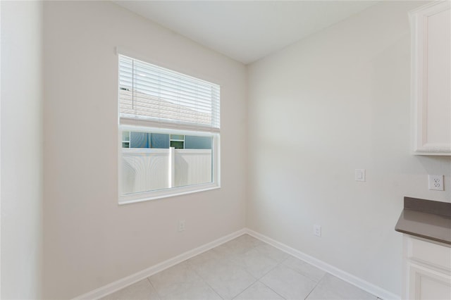 view of tiled empty room