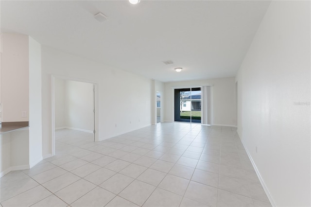 view of tiled spare room