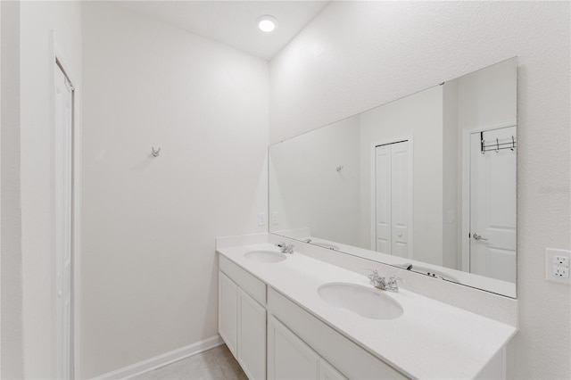 bathroom featuring vanity and tile patterned floors