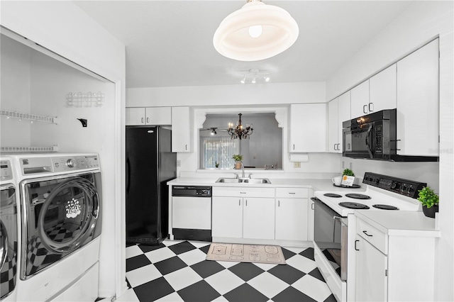 kitchen with white cabinetry, sink, washing machine and clothes dryer, black appliances, and an inviting chandelier