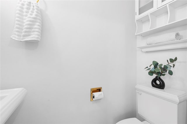 bathroom featuring toilet