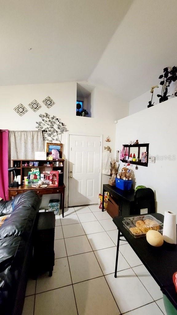 1417 Brookebridge Dr, Orlando, FL 32825 - interior space with lofted ceiling
