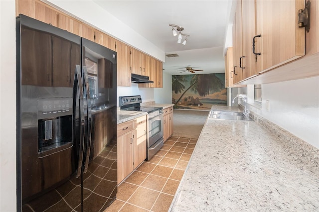 kitchen with sink, light tile patterned floors, ceiling fan, electric range, and black fridge