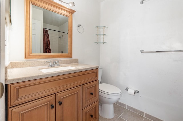 bathroom featuring vanity, curtained shower, tile patterned floors, and toilet