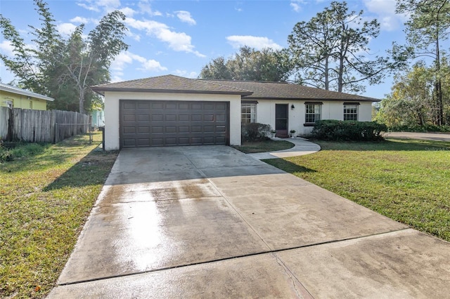 single story home with a garage and a front yard