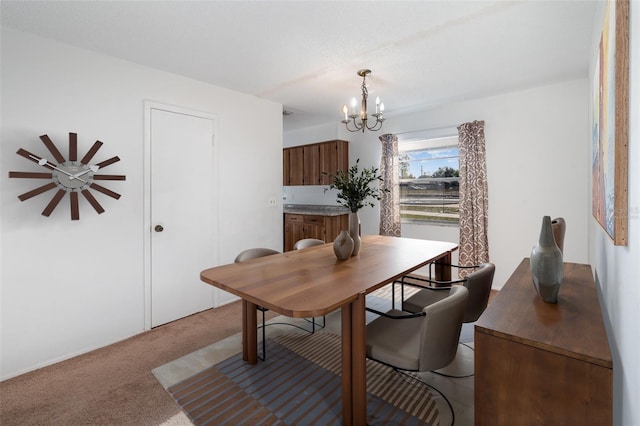 306 Loch Low Dr, Sanford, FL 32773 - dining area featuring a chandelier and light carpet