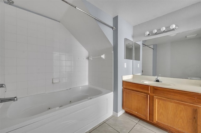 bathroom with tile patterned floors, shower / washtub combination, and vanity