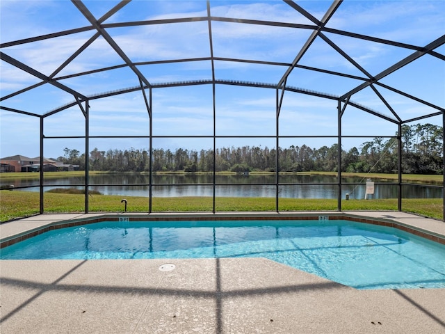 view of pool with a water view, a patio area, and glass enclosure