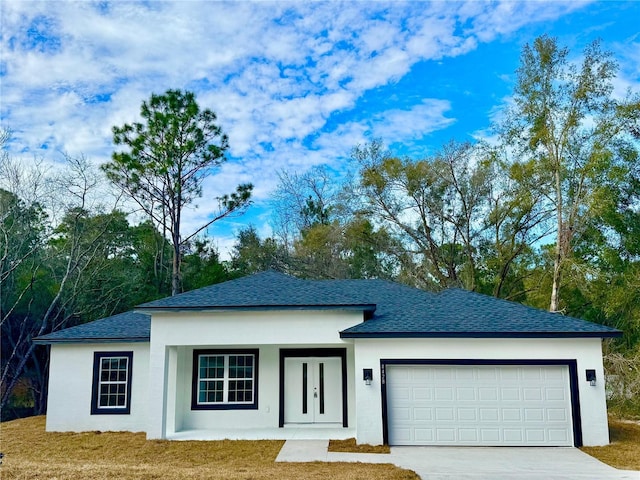 view of front of house with a garage