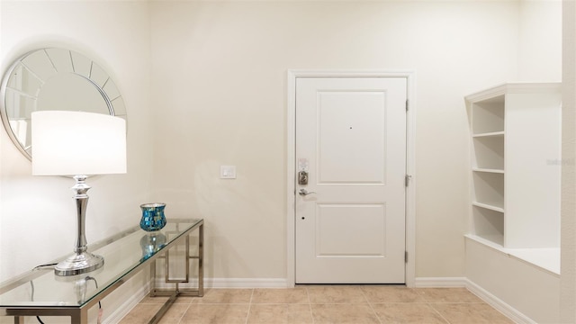 view of tiled foyer entrance