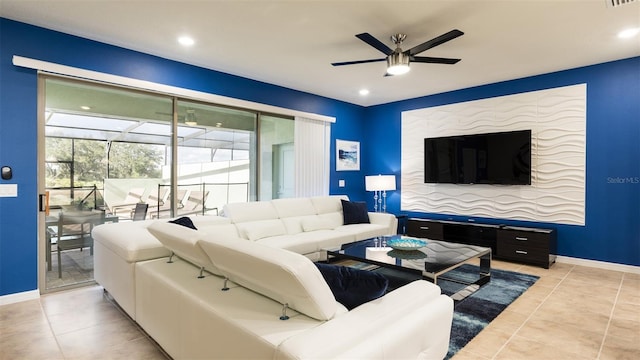 living room with ceiling fan and light tile patterned floors