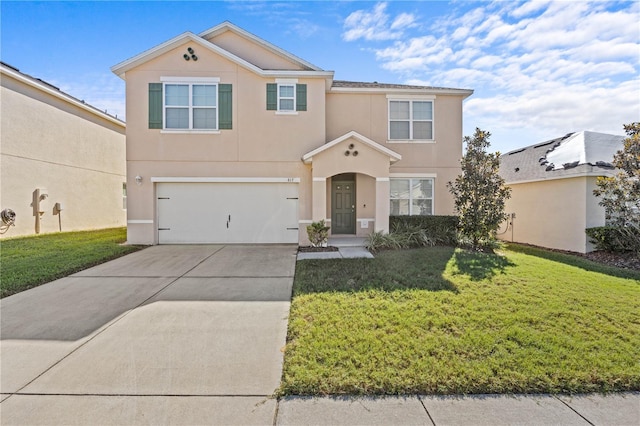 view of front of home with a garage and a front lawn