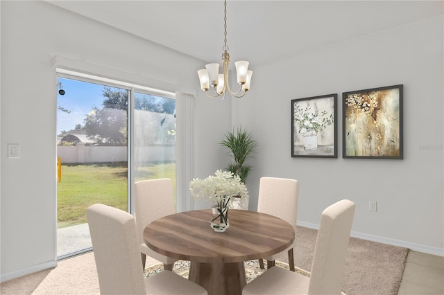 dining area featuring a chandelier