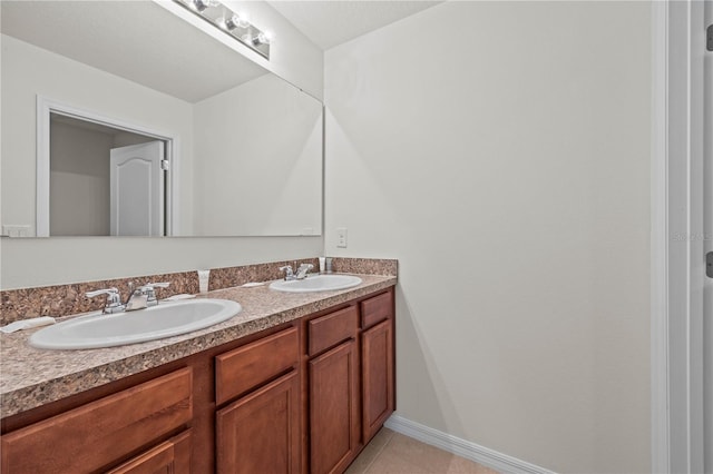 bathroom featuring vanity and tile patterned floors