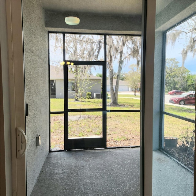 view of unfurnished sunroom