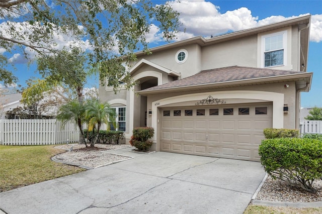 view of front of property with a garage