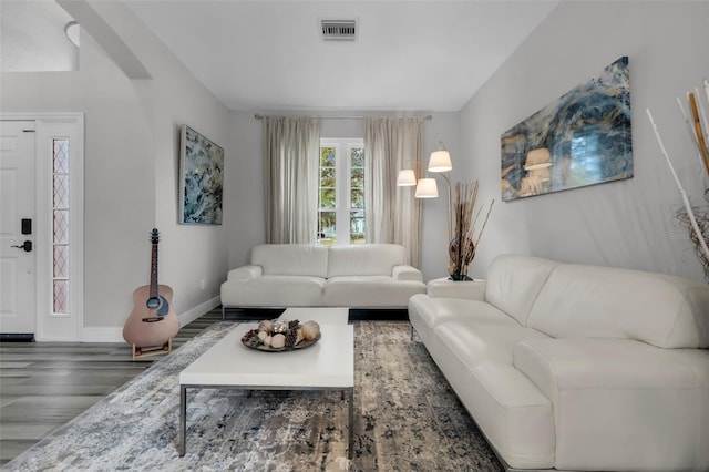 living room with dark wood-type flooring