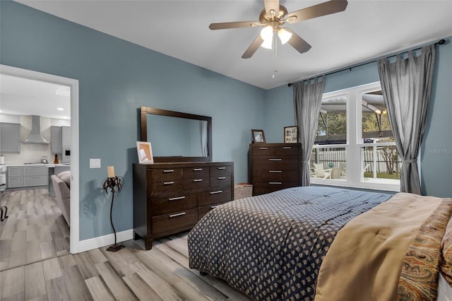 bedroom featuring ceiling fan and light wood-type flooring