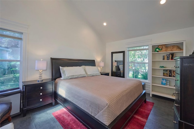 bedroom with lofted ceiling and recessed lighting