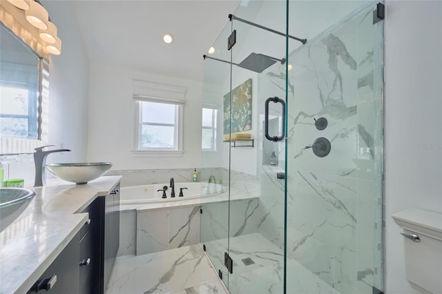 bathroom with marble finish floor, a marble finish shower, double vanity, a sink, and a bath