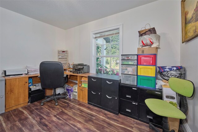 office area with dark wood-style flooring