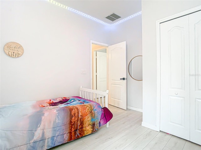 bedroom featuring light hardwood / wood-style floors