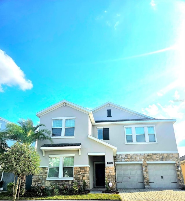 view of front of home featuring a garage