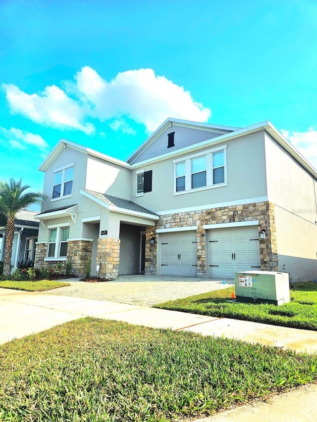 view of front of property featuring a garage