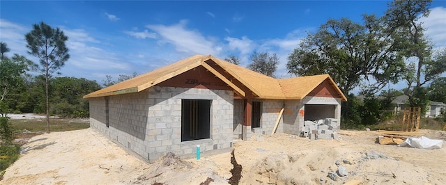 exterior space with concrete block siding
