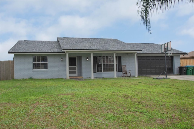 ranch-style house with a garage and a front yard