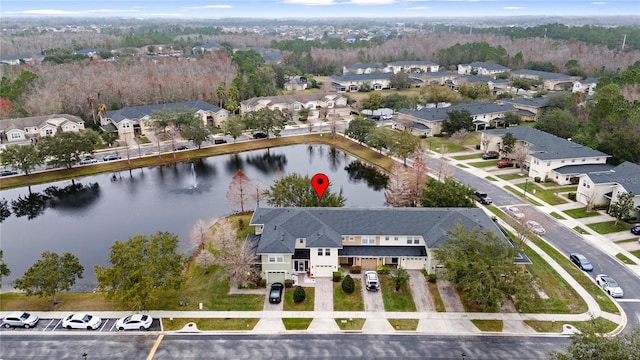 aerial view featuring a residential view and a water view