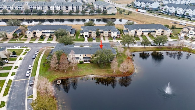 aerial view featuring a residential view and a water view
