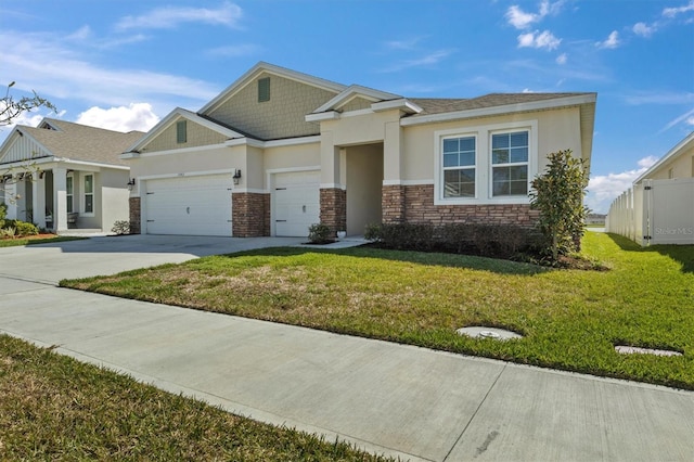 view of front of property with a garage and a front lawn