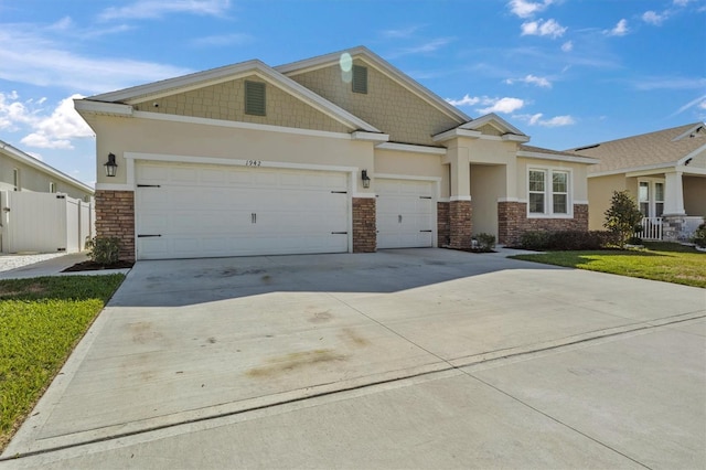 craftsman-style house with a front yard